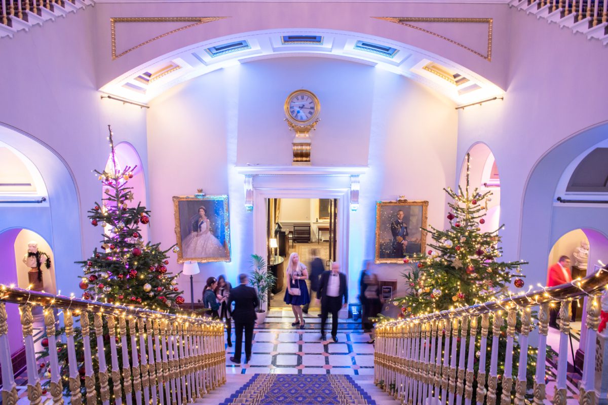 the staircase dressed for Christmas at 116 Pall Mall